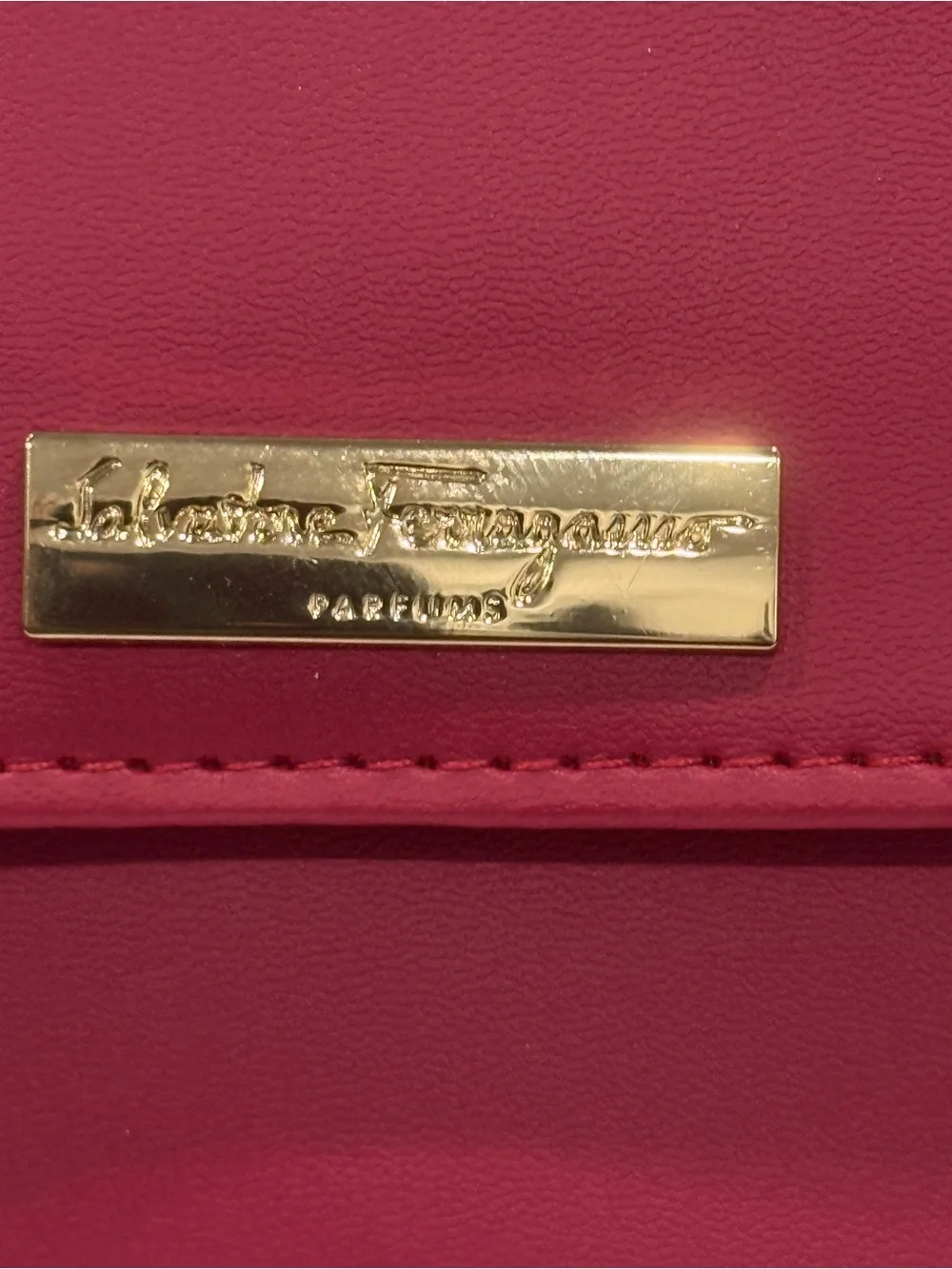 Salvatore Ferragamo Fuchsia. Faux Leather Cosmetic Case with Gold Plaque